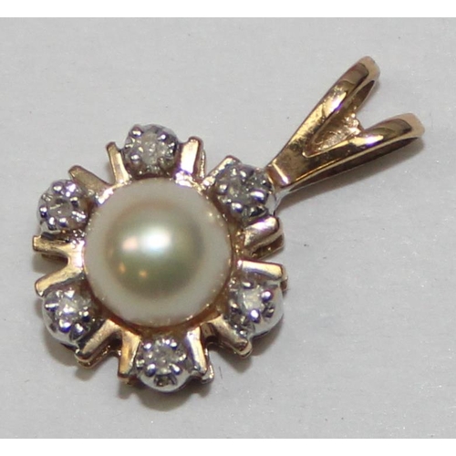 2440 - A 9ct gold pendant mounted with a small pearl surrounded by diamonds, marked 9k and XRF confirmed, a... 