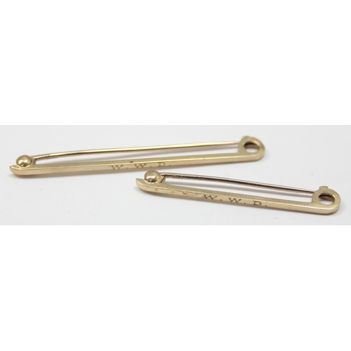 2442 - A pair of 9ct gold gentleman's tie pins in original box by Tessiers of Bond St, each engraved W.W.D ... 