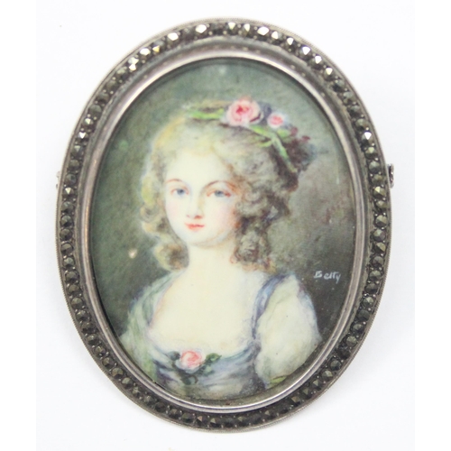 2444 - A vintage hand painted portrait miniature brooch in silver marcasite mount, the painting depicting a... 