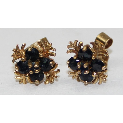 2449 - A pair of retro style 9ct gold earrings, each set with 4 small sapphires in square setting, marked a... 