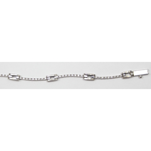 2452 - A retro style 18ct white gold and diamond set bracelet, marked and XRF confirmed, approx 20cm long, ... 