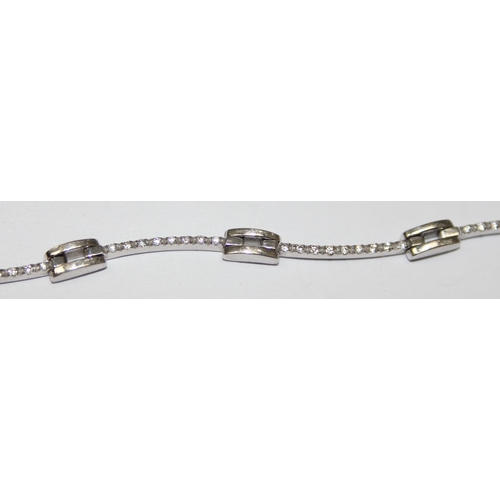 2452 - A retro style 18ct white gold and diamond set bracelet, marked and XRF confirmed, approx 20cm long, ... 