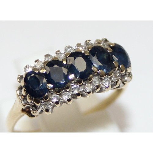 2454 - A vintage 9ct gold, sapphire and 0.15ct diamond ring, marked and XRF confirmed, approx size M, appro... 