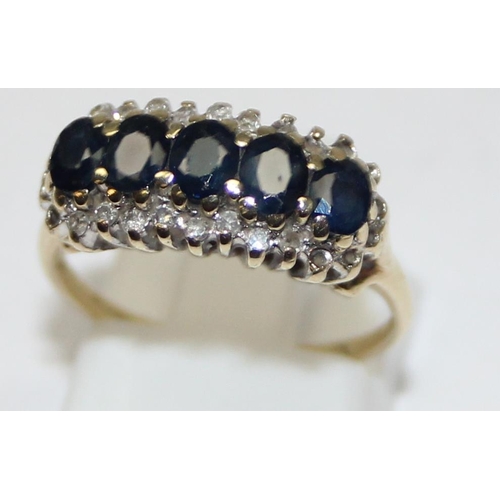 2454 - A vintage 9ct gold, sapphire and 0.15ct diamond ring, marked and XRF confirmed, approx size M, appro... 