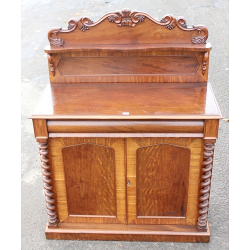 117 - A 19th century mahogany sideboard with shelf over a hidden drawer and a cupboard, approx 120cm wide ... 