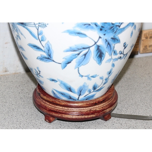 261 - A Chinese blue & white pottery table lamp with shade, approx 58cm tall