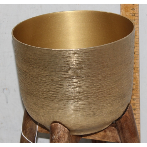 288 - A retro gilt metal plant pot or jardinière on wooden stand, approx 19cm in diameter x 35cm tall