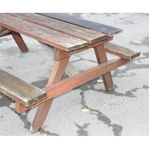 325 - Hard wood garden picnic bench, approx size 183cm long x 155cm wide