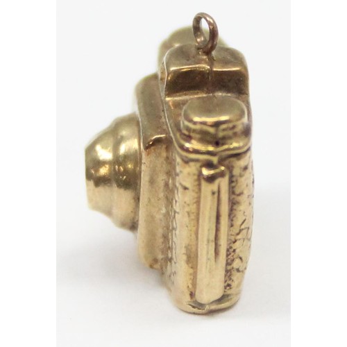 2310 - A vintage 9ct gold pendant or charm formed as a 1960's camera, marked and XRF confirmed, approx 0.88... 