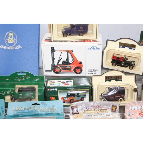 1558 - A large qty of assorted boxed model vehicles to inc Britains & Corgi Legends of Speed