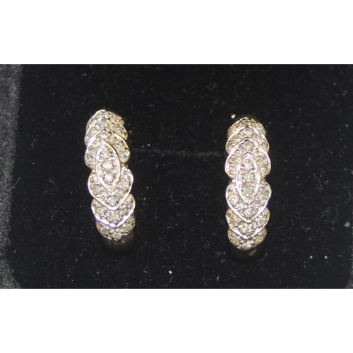 2453 - A pair of 9ct gold and pave diamond set earrings, marked and XRF confirmed, approx 2.61g gross