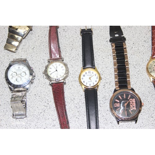1353 - A large qty of assorted modern dress watches and other watches etc