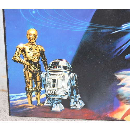 1505 - Star Wars wall clock, approx 36cm x 28cm