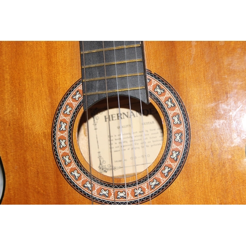 604 - 2 acoustic guitars, one with soft case