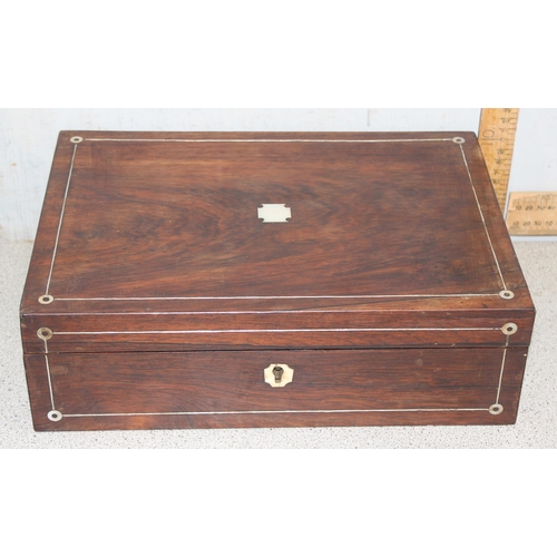 270 - An antique Rosewood writing slope with mother of pearl and polished pewter inlay and recessed brass ... 