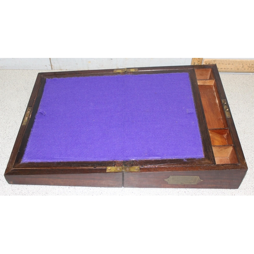 270 - An antique Rosewood writing slope with mother of pearl and polished pewter inlay and recessed brass ... 