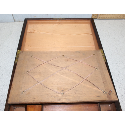 270 - An antique Rosewood writing slope with mother of pearl and polished pewter inlay and recessed brass ... 