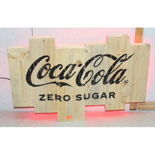 408 - A retro style back lit Coca-Cola advertising sign, wood effect, approx 58cm wide