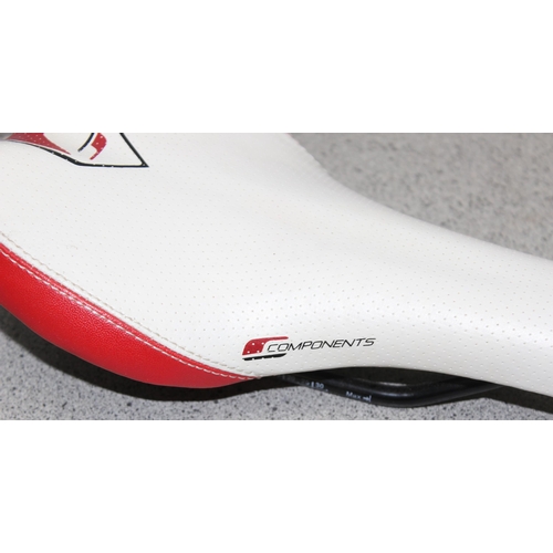 701 - 2 Components bicycle racing saddles & a bicycle rack
