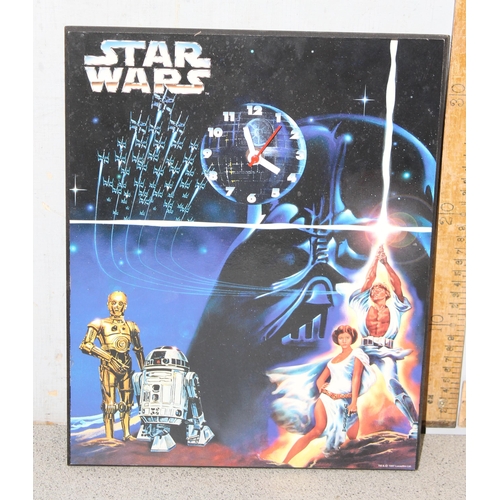 1505 - Star Wars wall clock, approx 36cm x 28cm