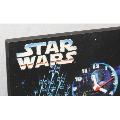 1505 - Star Wars wall clock, approx 36cm x 28cm