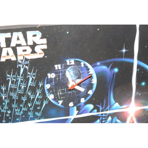 1505 - Star Wars wall clock, approx 36cm x 28cm