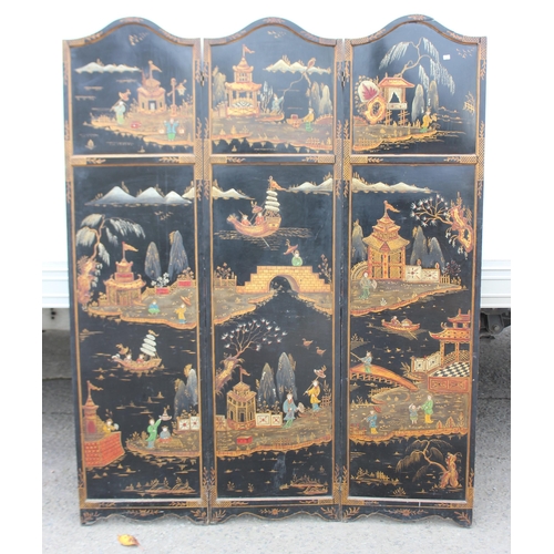 15 - A vintage Oriental painted black lacquer 3 fold room divider or dressing screen, hand painted with v... 