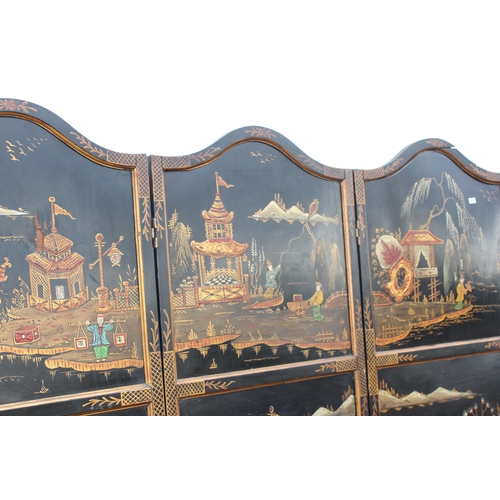 15 - A vintage Oriental painted black lacquer 3 fold room divider or dressing screen, hand painted with v... 