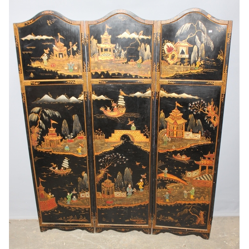 15 - A vintage Oriental painted black lacquer 3 fold room divider or dressing screen, hand painted with v... 