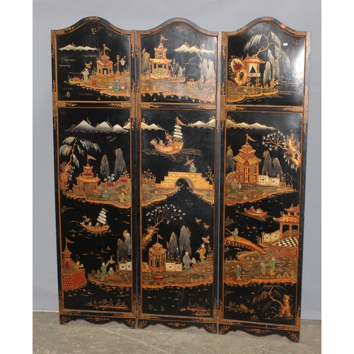 15 - A vintage Oriental painted black lacquer 3 fold room divider or dressing screen, hand painted with v... 