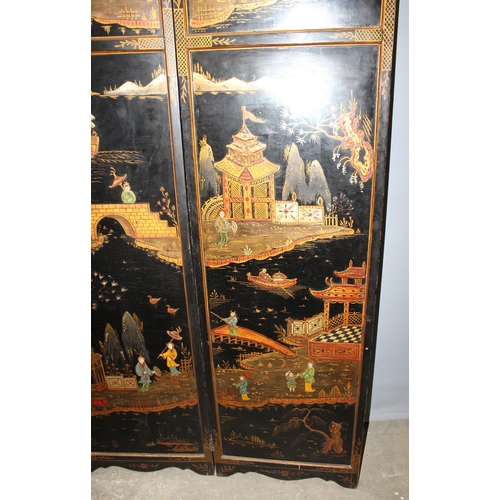 15 - A vintage Oriental painted black lacquer 3 fold room divider or dressing screen, hand painted with v... 