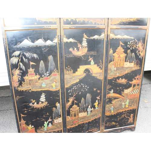 15 - A vintage Oriental painted black lacquer 3 fold room divider or dressing screen, hand painted with v... 