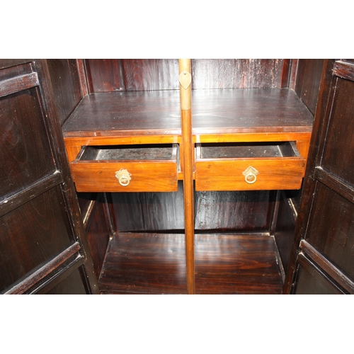 19 - A Chinese hardwood marriage cabinet, likely Elm with brass fittings, likely 20th century, approx 87c... 