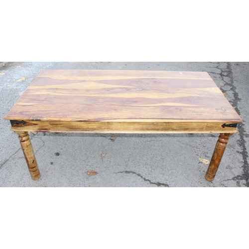 43 - A modern striated Indian hardwood dining table with iron accents, approx 179cm wide x 90cm deep x 77... 