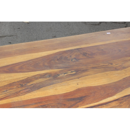 43 - A modern striated Indian hardwood dining table with iron accents, approx 179cm wide x 90cm deep x 77... 