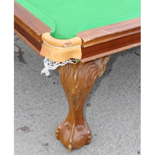 45 - A good quality modern dining table with snooker table base, the snooker table with baize lined slate... 