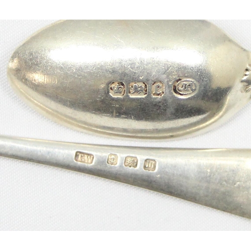 1005 - 2 silver spoons, Birmingham 1911 & Sheffield 1897, approx 31.92g gross