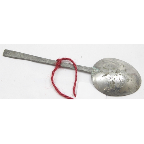 1006 - An antique pewter spoon with touchmark to bowl, hand written note that it was dug up in an orchard, ... 