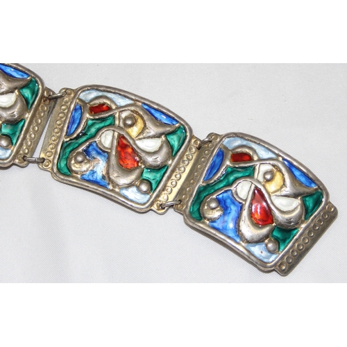 1103 - A Scandinavian silver and enamel bracelet by Oystein Balle of Norway, comprised of four linked panel... 