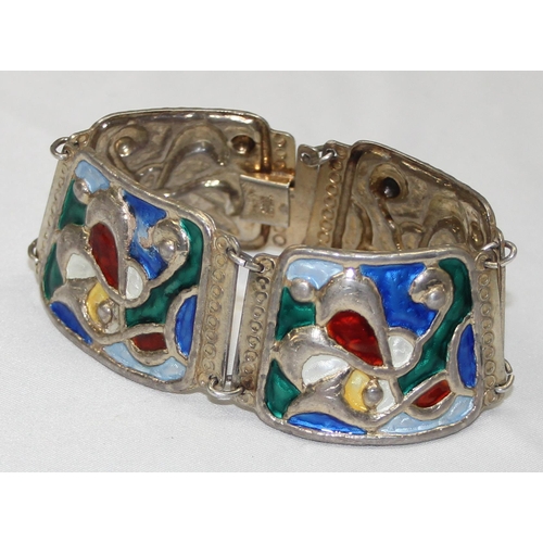 1103 - A Scandinavian silver and enamel bracelet by Oystein Balle of Norway, comprised of four linked panel... 