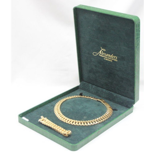 1105 - An Italian 18ct gold matching necklace and bracelet set, both pieces marked 18kt Italy and XRF confi... 