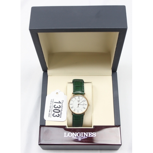 1303 - A Longines Quartz Presence 156-6801 dress watch with gold plated case, in original box with leather ... 