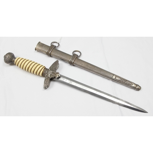 1400 - A 2nd pattern Luftwaffe dagger and scabbard by Paul Weyersberg, the pointed blade marked for Paul We... 