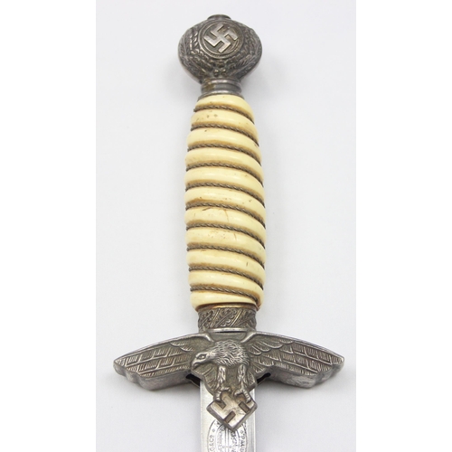 1400 - A 2nd pattern Luftwaffe dagger and scabbard by Paul Weyersberg, the pointed blade marked for Paul We... 