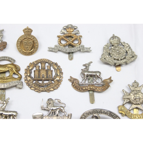 1410 - Military cap badges - 17 assorted military cap badges all relating to the Midlands, to include North... 