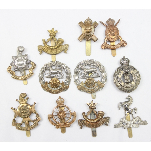 1415 - Military cap badges - 11 assorted military cap badges all relating to the South East and Islands, to... 