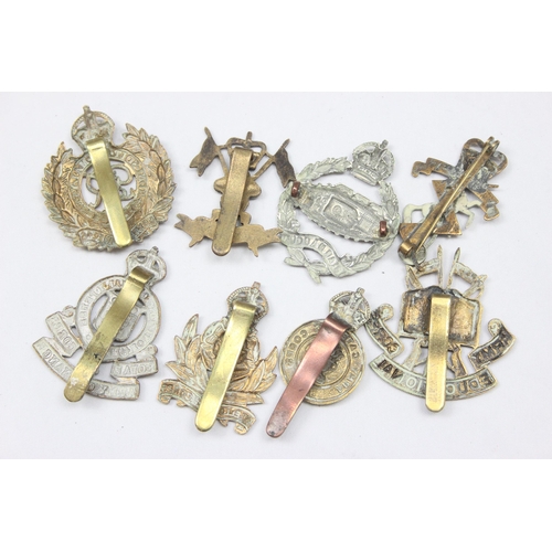 1422 - Military cap badges - 8 assorted military cap badges, various regiments to include Army Education Co... 