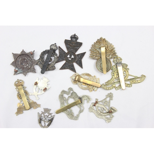 1423 - Military cap badges - 11 assorted military cap badges, various regiments to include 4/7th Royal Drag... 