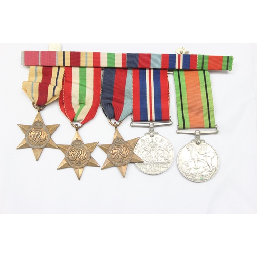 1427 - WW2 medal bar and medals to inc Africa, Italy and 1939-49 star, Defence Medal and 1939-45 War Medal,... 