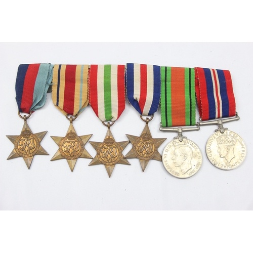 1428 - WW2 6 medal bar and medals to inc Africa, Italy, France & Germany and 1939-49 star, Defence Medal an... 